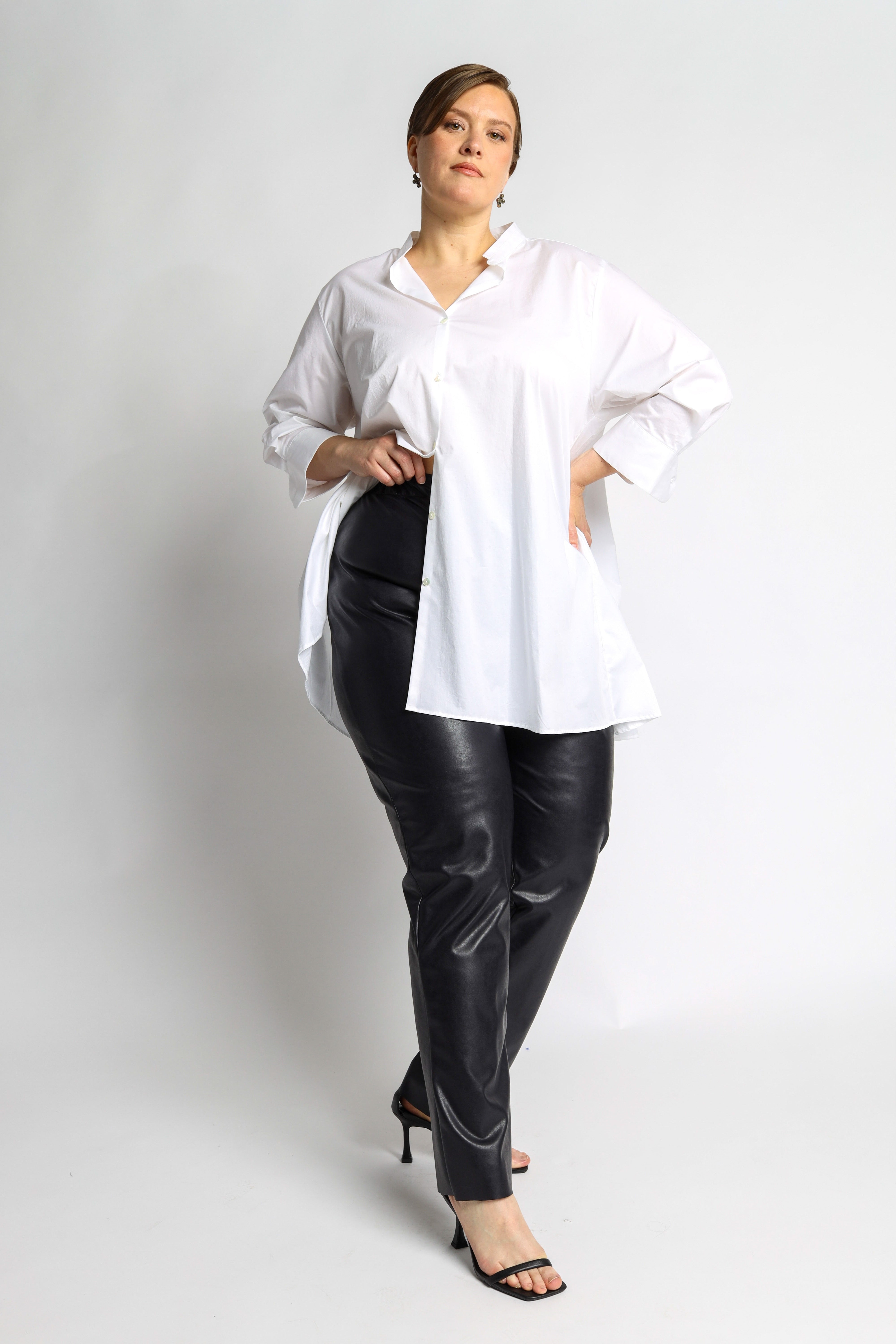 long blouse with ruffled back and small mock collar