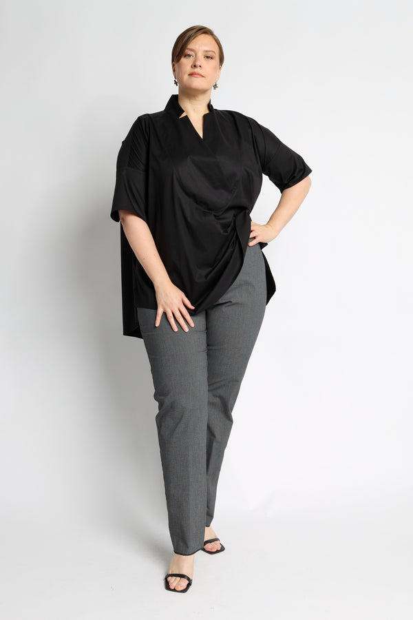 wide blouse with short cuff sleeves and a kimono inspired neckline